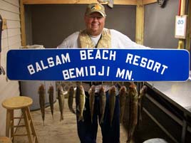 Resort sign stringer of fish at Balsam Beach Resort.